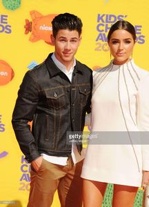 host-nick-jonas-and-model-olivia-culpo-attend-nickelodeons-28th-kids-picture-id468026372.jpg