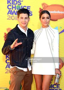 host-nick-jonas-and-olivia-culpo-attend-nickelodeons-28th-annual-kids-picture-id467936890.jpg