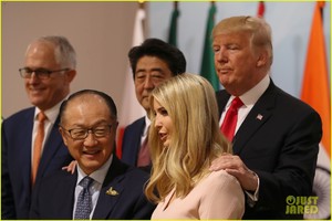 ivanka-trump-sits-in-presidents-seat-at-g20-leaders-table-08.jpg