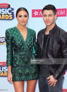 miss-universe-2012-olivia-culpo-and-singer-nick-jonas-attend-the-2015-picture-id471159586.jpg
