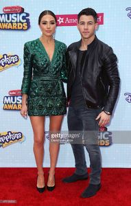 miss-universe-2012-olivia-culpo-and-singer-nick-jonas-attend-the-2015-picture-id471159590.jpg