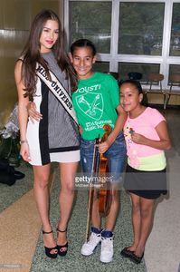 miss-universe-2012-olivia-culpo-poses-with-students-at-one-world-on-picture-id175266890.jpg