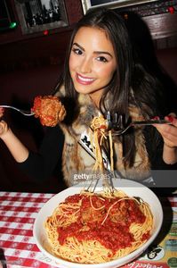 miss-universe-olivia-culpo-visits-buca-di-beppo-times-square-on-april-picture-id166556710.jpg