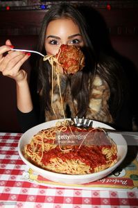 miss-universe-olivia-culpo-visits-buca-di-beppo-times-square-on-april-picture-id166556722.jpg