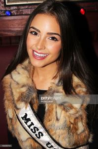 miss-universe-olivia-culpo-visits-buca-di-beppo-times-square-on-april-picture-id166556733.jpg