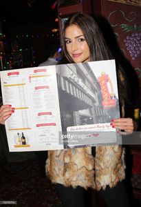 miss-universe-olivia-culpo-visits-buca-di-beppo-times-square-on-april-picture-id166556744.jpg