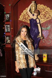 miss-universe-olivia-culpo-visits-buca-di-beppo-times-square-on-april-picture-id166556745.jpg