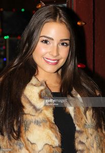 miss-universe-olivia-culpo-visits-buca-di-beppo-times-square-on-april-picture-id166556764.jpg