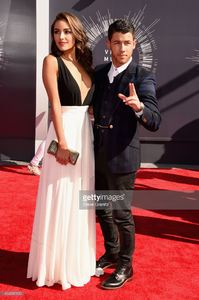 model-olivia-culpo-and-recording-artist-nick-jonas-attend-the-2014-picture-id454095130.jpg