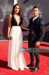 model-olivia-culpo-and-recording-artist-nick-jonas-attend-the-2014-picture-id454095140.jpg