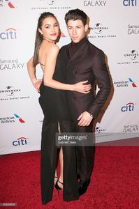 nick-jonas-and-olivia-culpo-arrive-for-the-universal-music-group-2015-picture-id463068656.jpg