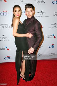 nick-jonas-and-olivia-culpo-arrive-for-the-universal-music-group-2015-picture-id463068664.jpg