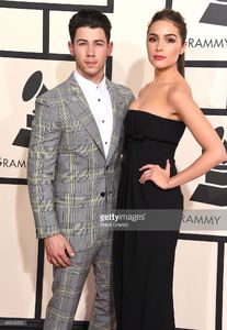 nick-jonas-and-olivia-culpo-arrives-at-the-the-57th-annual-grammy-on-picture-id463132520.jpg