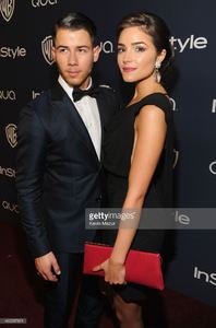 nick-jonas-and-olivia-culpo-attend-the-2014-instyle-and-warner-bros-picture-id462287851.jpg