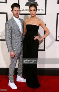 nick-jonas-and-olivia-culpo-attend-the-57th-annual-grammy-awards-at-picture-id463088308.thumb.jpg.9de00738532b1238c0175eb6ab52450d.jpg