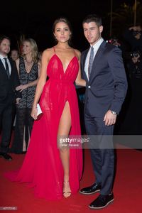 nick-jonas-and-olivia-culpo-attend-the-opening-red-carpet-party-2014-picture-id457175196.jpg
