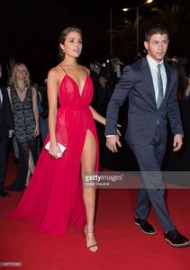 nick-jonas-and-olivia-culpo-attend-the-opening-red-carpet-party-2014-picture-id457175248.jpg