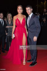 nick-jonas-and-olivia-culpo-attend-the-opening-red-carpet-party-2014-picture-id457175296.jpg