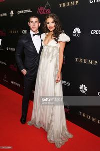 nick-jonas-and-olivia-culpo-attends-the-red-carpet-at-miss-universe-picture-id187500684.jpg