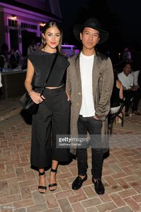 olivia-culpo-and-michael-mente-attend-the-revolve-hamptons-house-on-picture-id481989182.jpg
