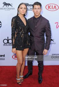 olivia-culpo-and-nick-jonas-arrive-at-the-2015-billboard-music-awards-picture-id473860946.jpg