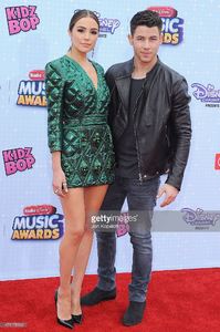 olivia-culpo-and-nick-jonas-arrive-at-the-2015-radio-disney-music-at-picture-id471178192.jpg