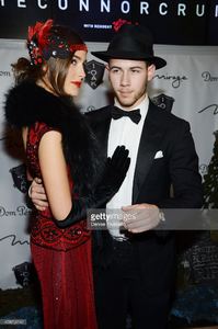 olivia-culpo-and-nick-jonas-arrive-at-the-halloween-costume-party-at-picture-id458214142.jpg