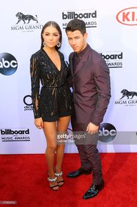 olivia-culpo-and-nick-jonas-arrive-for-the-2015-billboard-music-on-picture-id473860032.jpg