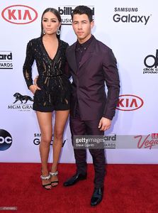 olivia-culpo-and-nick-jonas-arrives-at-the-2015-billboard-music-at-picture-id474016890.jpg