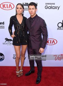 olivia-culpo-and-nick-jonas-arrives-at-the-2015-billboard-music-at-picture-id474016892.jpg