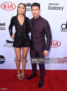 olivia-culpo-and-nick-jonas-arrives-at-the-2015-billboard-music-at-picture-id474016896.jpg