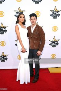 olivia-culpo-and-nick-jonas-attend-the-50th-academy-of-country-music-picture-id470435066.jpg