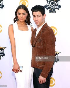 olivia-culpo-and-nick-jonas-attend-the-50th-academy-of-country-music-picture-id470435116.jpg