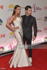olivia-culpo-and-nick-jonas-attend-the-63rd-annual-miss-universe-at-picture-id462182206.jpg