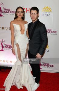 olivia-culpo-and-nick-jonas-attend-the-63rd-annual-miss-universe-red-picture-id462196320.jpg