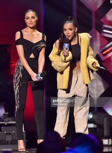 olivia-culpo-and-tinashe-perform-onstage-during-z100s-jingle-ball-at-picture-id628843636.jpg