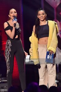 olivia-culpo-and-tinashe-perform-onstage-during-z100s-jingle-ball-at-picture-id628843638.jpg