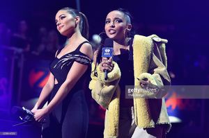 olivia-culpo-and-tinashe-perform-onstage-during-z100s-jingle-ball-at-picture-id628844596.jpg