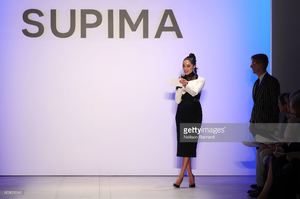 olivia-culpo-and-vp-marketing-and-promotions-at-supima-buxton-s-picture-id600629242.jpg