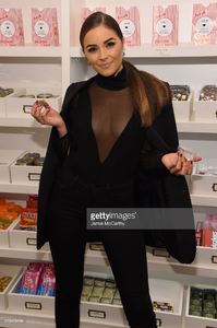 olivia-culpo-attends-stuart-weitzmans-launch-of-the-gigi-boot-on-26-picture-id618408488.jpg
