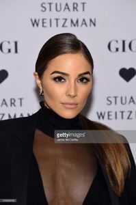 olivia-culpo-attends-stuart-weitzmans-launch-of-the-gigi-boot-on-26-picture-id618408492.jpg