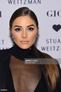 olivia-culpo-attends-stuart-weitzmans-launch-of-the-gigi-boot-on-26-picture-id618408494.jpg