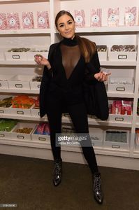 olivia-culpo-attends-stuart-weitzmans-launch-of-the-gigi-boot-on-26-picture-id618408496.jpg