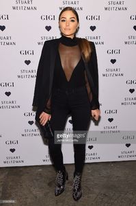 olivia-culpo-attends-stuart-weitzmans-launch-of-the-gigi-boot-on-26-picture-id618408506.jpg
