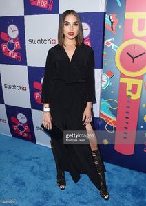 olivia-culpo-attends-the-swatch-a-night-of-pop-store-opening-at-picture-id528145912.jpg