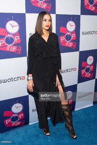 olivia-culpo-attends-the-swatch-a-night-of-pop-store-opening-on-may-picture-id527957242.jpg