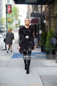 olivia-culpo-is-wearing-a-emanuel-ungaro-dress-bavna-jewelry-and-picture-id527393194.jpg