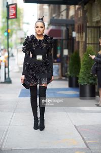 olivia-culpo-is-wearing-a-emanuel-ungaro-dress-bavna-jewelry-and-picture-id527393224.jpg