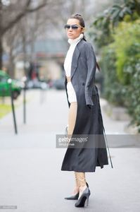 olivia-culpo-is-wearing-maiyet-coat-wolford-leather-pants-balenciaga-picture-id514027422.jpg