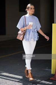 olivia-culpo-is-wearing-ports-1961-top-unravel-denim-chloe-bag-boots-picture-id541162006.jpg